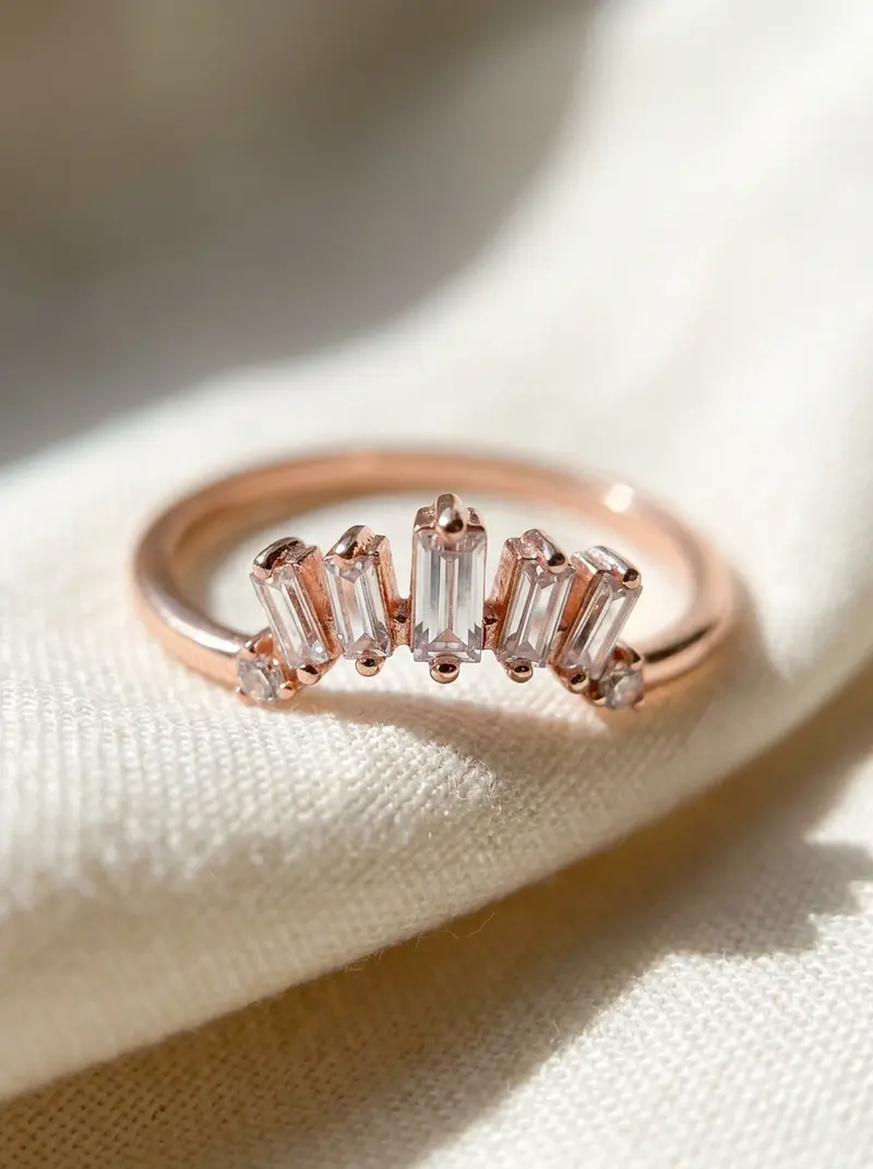 Close-up of the baguette crown ring on folded linen