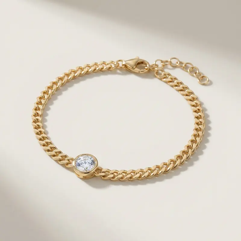 Solitaire curb bracelet on an off-white surface