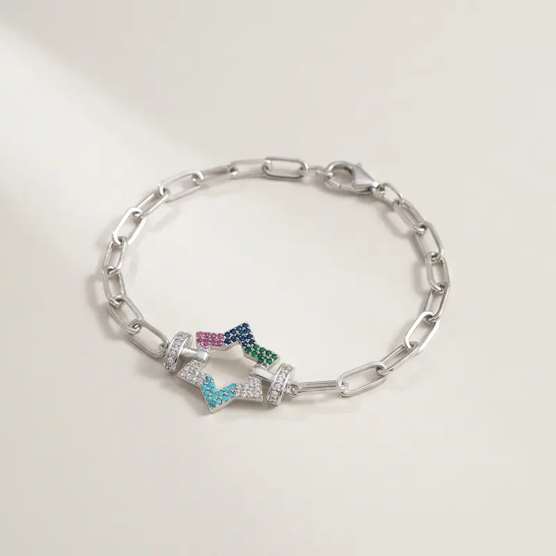 Star link bracelet on an off-white surface