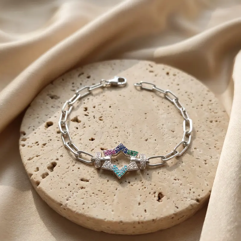 Star link bracelet on a travertine disc with silk